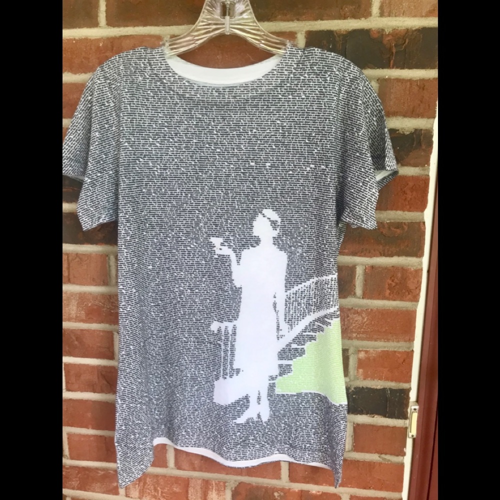 ladies M shirt with “The Great Gatsby” on it.